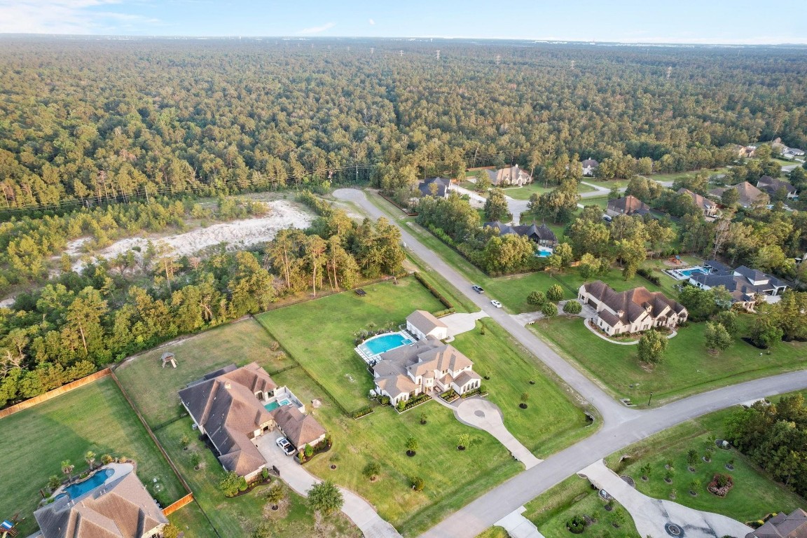 27494 South Lazy Meadow Way Spring, TX 77386 - Photo 5 of 49 an aerial view of a house with a lake view