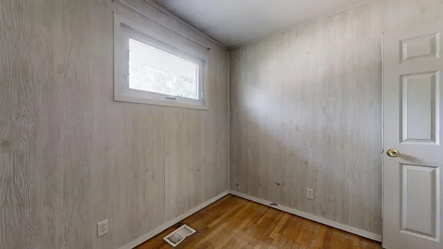 a view of a room with a window