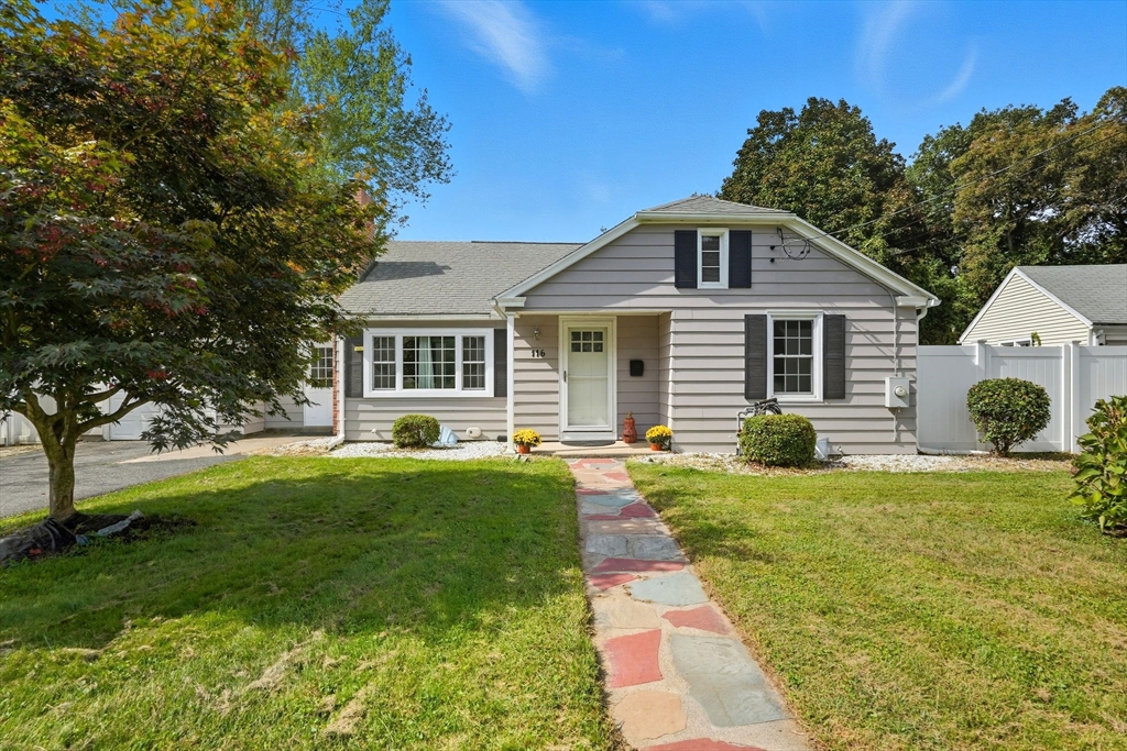 116 Hartwick Street Springfield, MA 01108 - Photo 1 of 38 a front view of a house with a yard