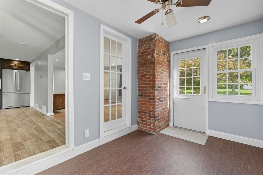 116 Hartwick Street Springfield, MA 01108 - Photo 25 of 38 an empty room with ceiling fan and windows