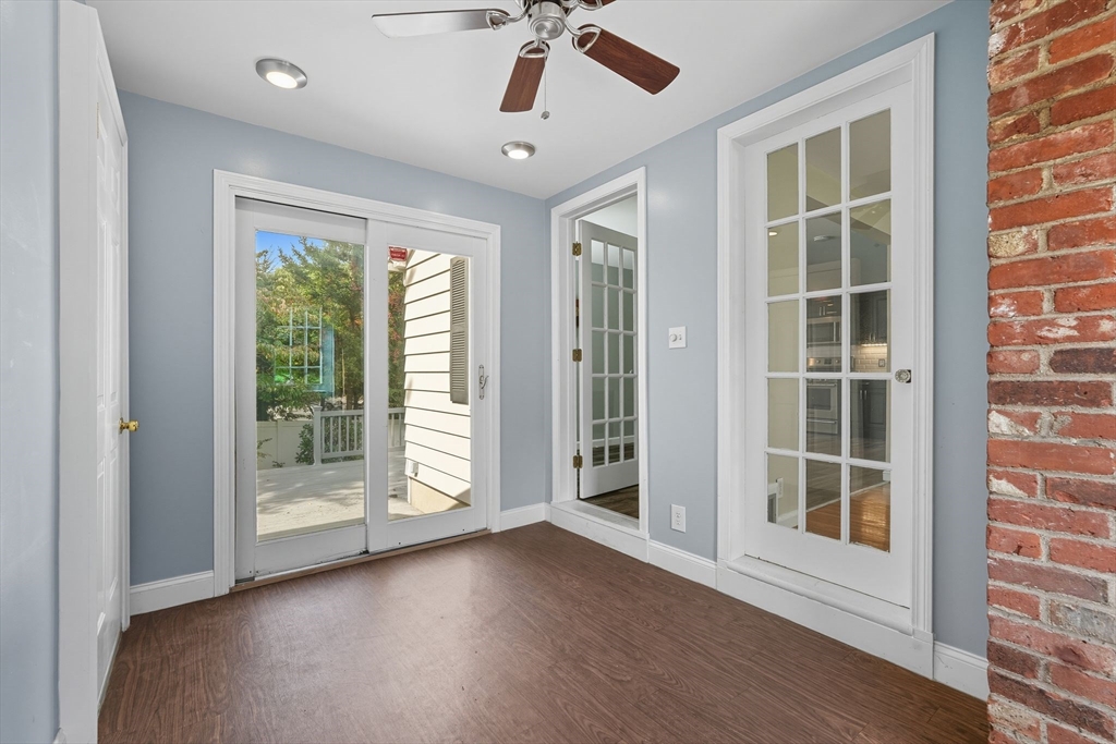 116 Hartwick Street Springfield, MA 01108 - Photo 26 of 38 a view of livingroom with window wooden floor and front door