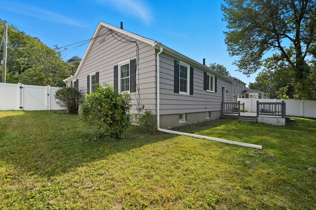116 Hartwick Street Springfield, MA 01108 - Photo 36 of 38 a front view of a house with a yard