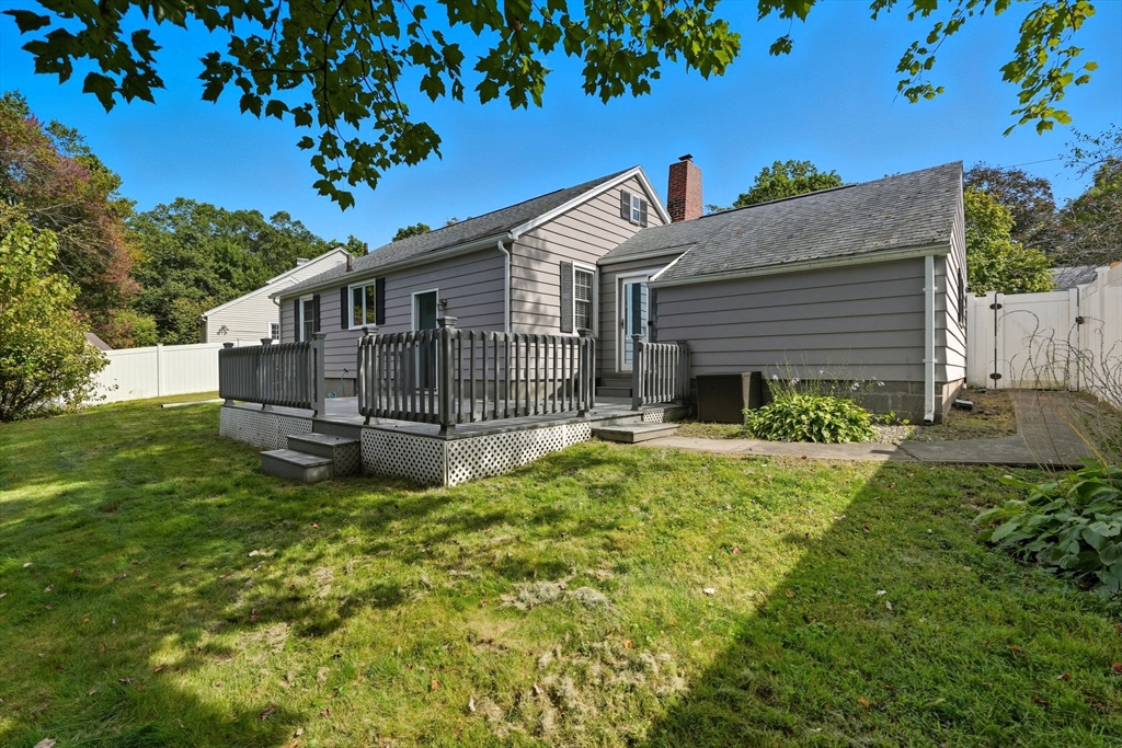 116 Hartwick Street Springfield, MA 01108 - Photo 38 of 38 a view of a house with a small yard and a garden