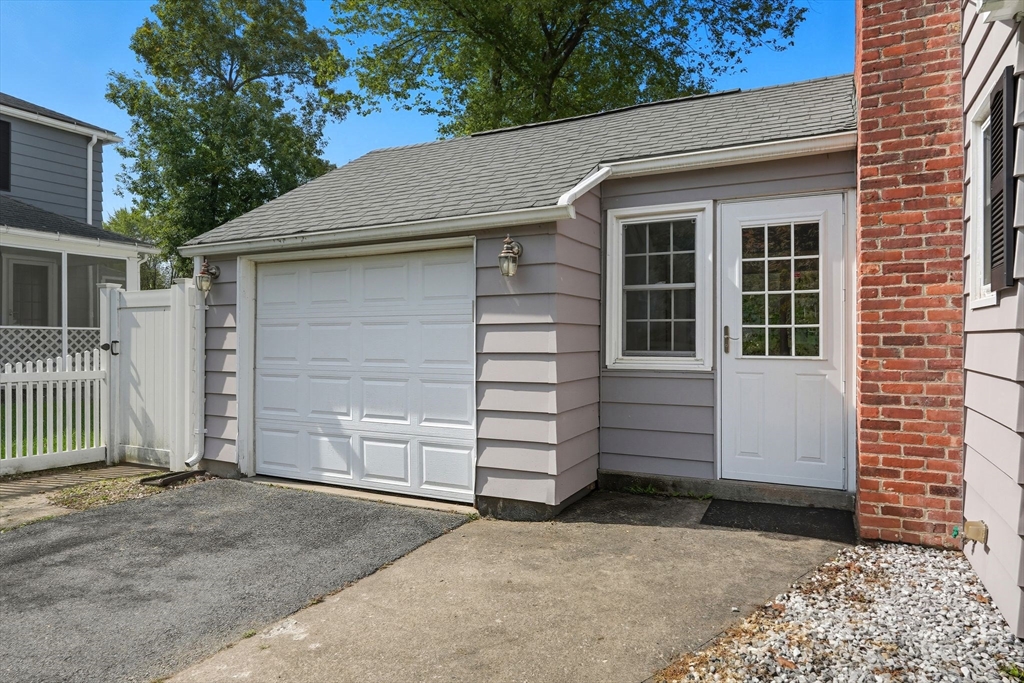 116 Hartwick Street Springfield, MA 01108 - Photo 5 of 38 a front view of a house with a yard