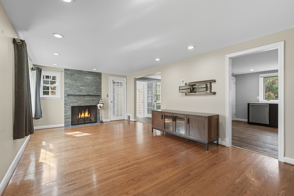 116 Hartwick Street Springfield, MA 01108 - Photo 7 of 38 a living room with furniture and a fireplace