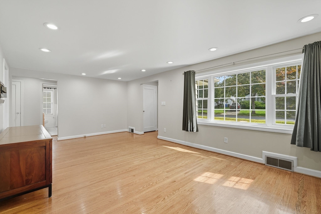 116 Hartwick Street Springfield, MA 01108 - Photo 9 of 38 a view of an empty room with a window