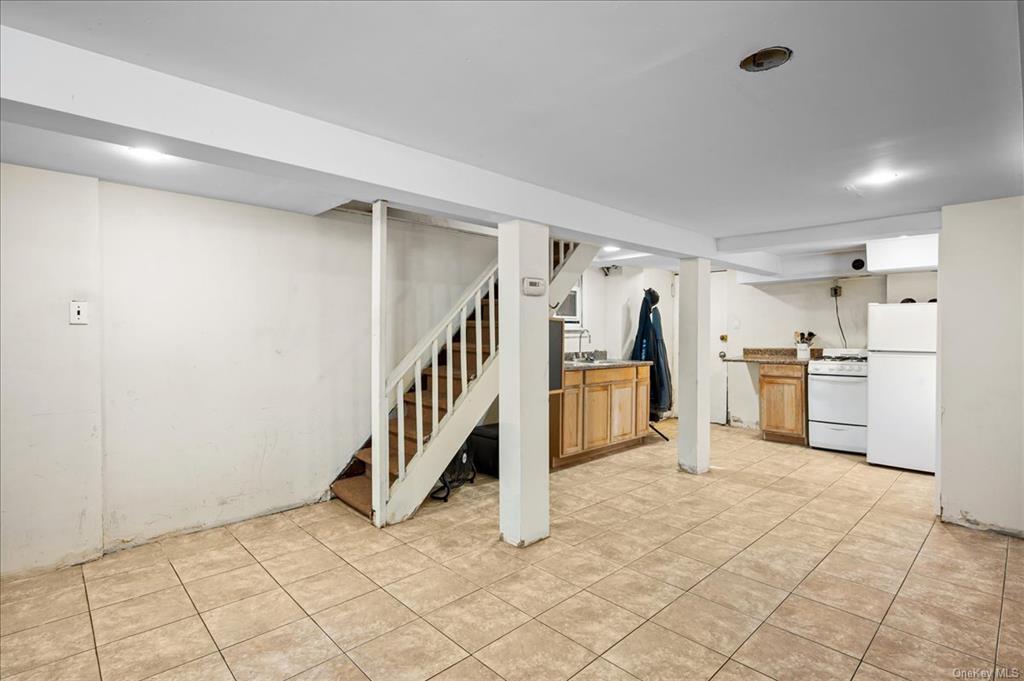 1076 Rhinelander Avenue Bronx, NY 10461 - Photo 24 of 31 a view of a storage & utility room and stairs