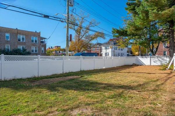 a view of a backyard of the house