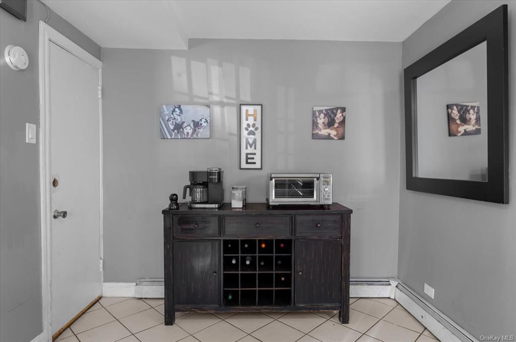 1076 Rhinelander Avenue Bronx, NY 10461 - Photo 9 of 31 a view of cabinets with wooden floor