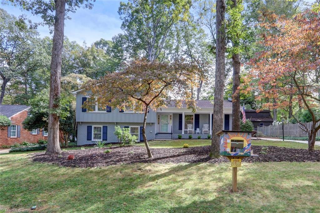 4407 Graham Road Greensboro, NC 27410 - Photo 2 of 28 Fantastic yard with mature trees in the heart of Hamilton Lakes. Share books with neighbors and friends with your very own "Book Box"!