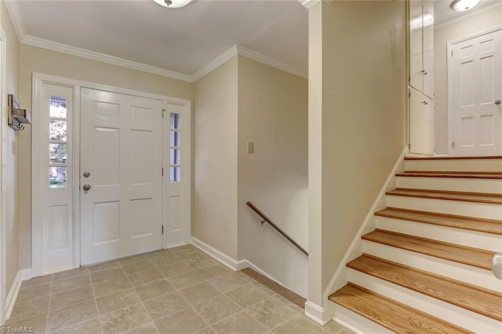 4407 Graham Road Greensboro, NC 27410 - Photo 28 of 28 Perfect floor plan flow with the split level foyer. Upstairs leads to 3 bedrooms and 2 full bathrooms with great storage. Down leads to bonus room and 4th bedroom with 3rd full bath.