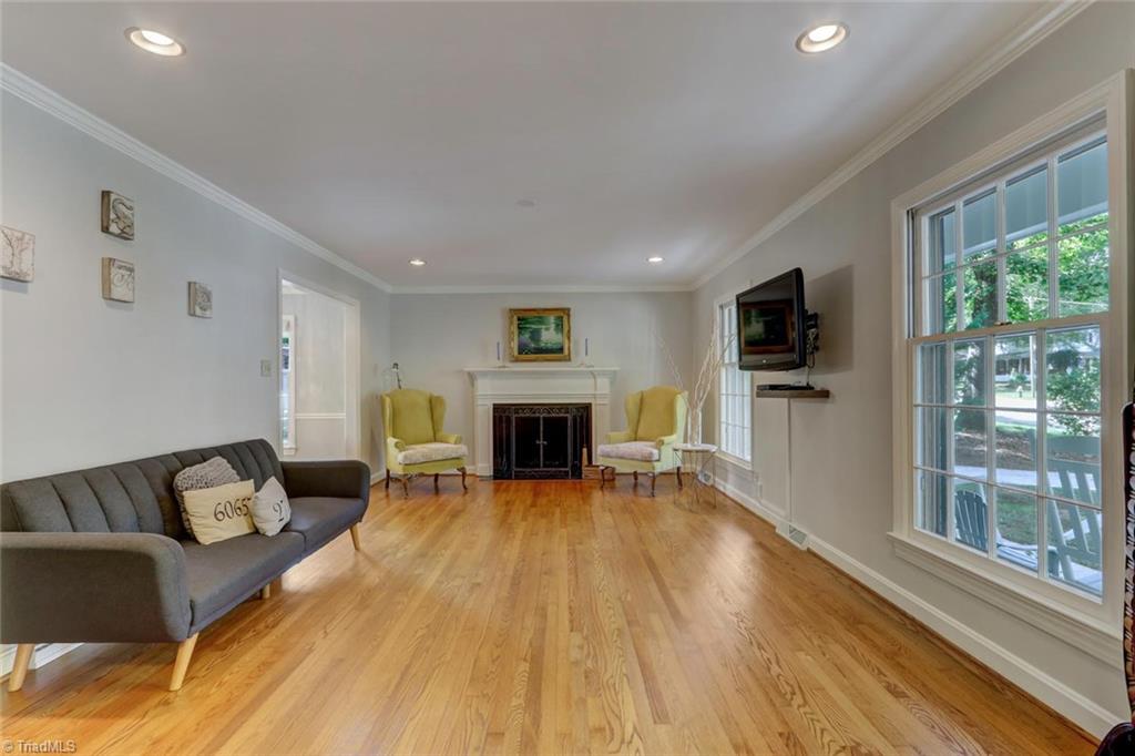 4407 Graham Road Greensboro, NC 27410 - Photo 4 of 28 To the right of the foyer is the amazing living room with beautiful windows overlooking the front yard. Recessed lighting, freshly painting and gleaming hardwood floors!