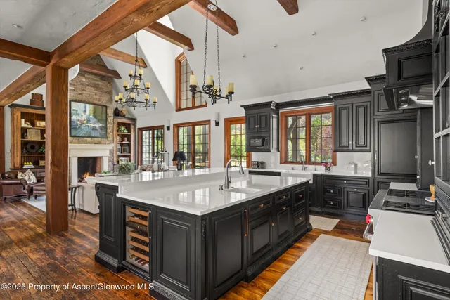 a kitchen with a stove and a sink