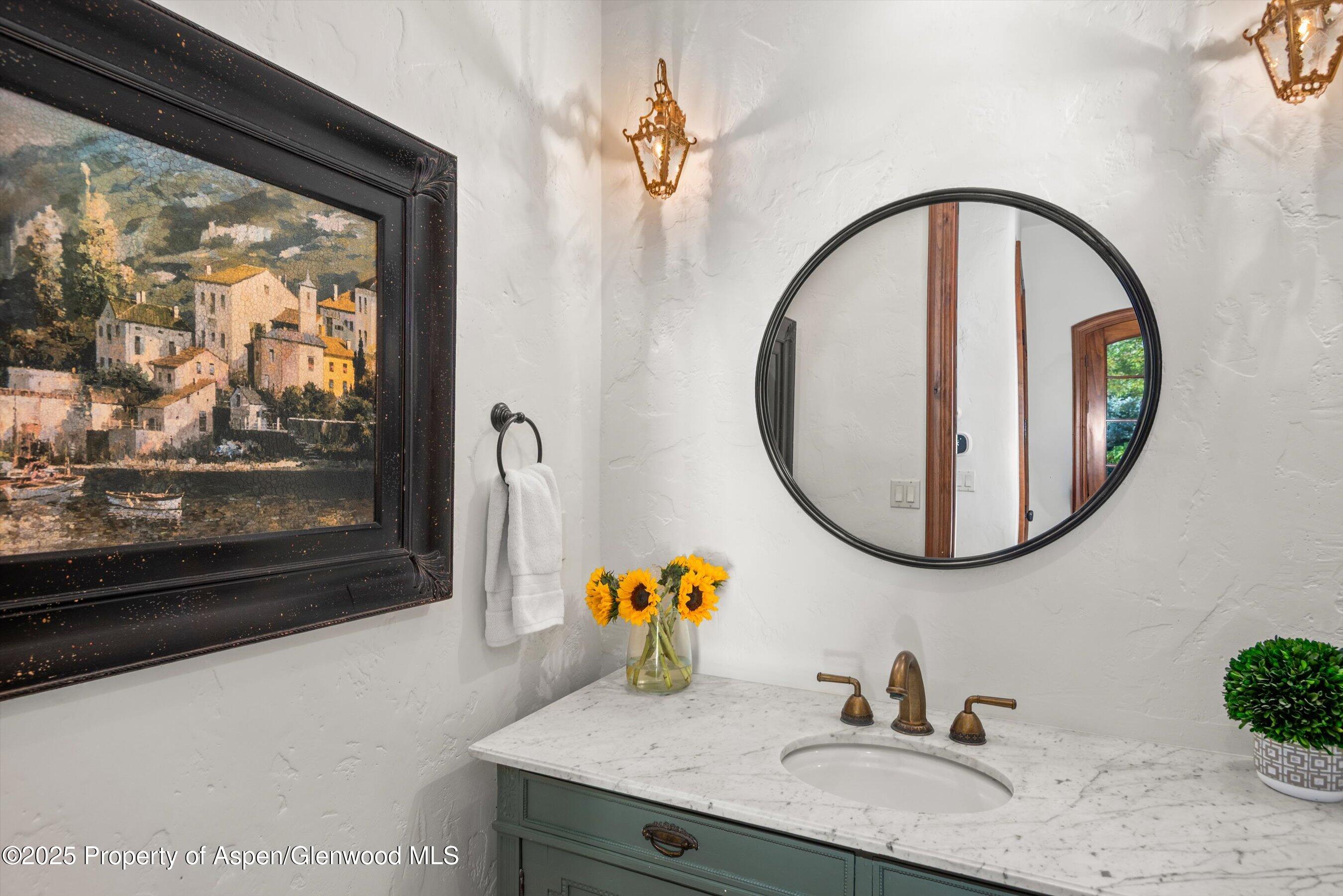 16 St Finnbar Farm Road Carbondale, CO 81623 - Photo 35 of 51 a bathroom with a sink and a mirror