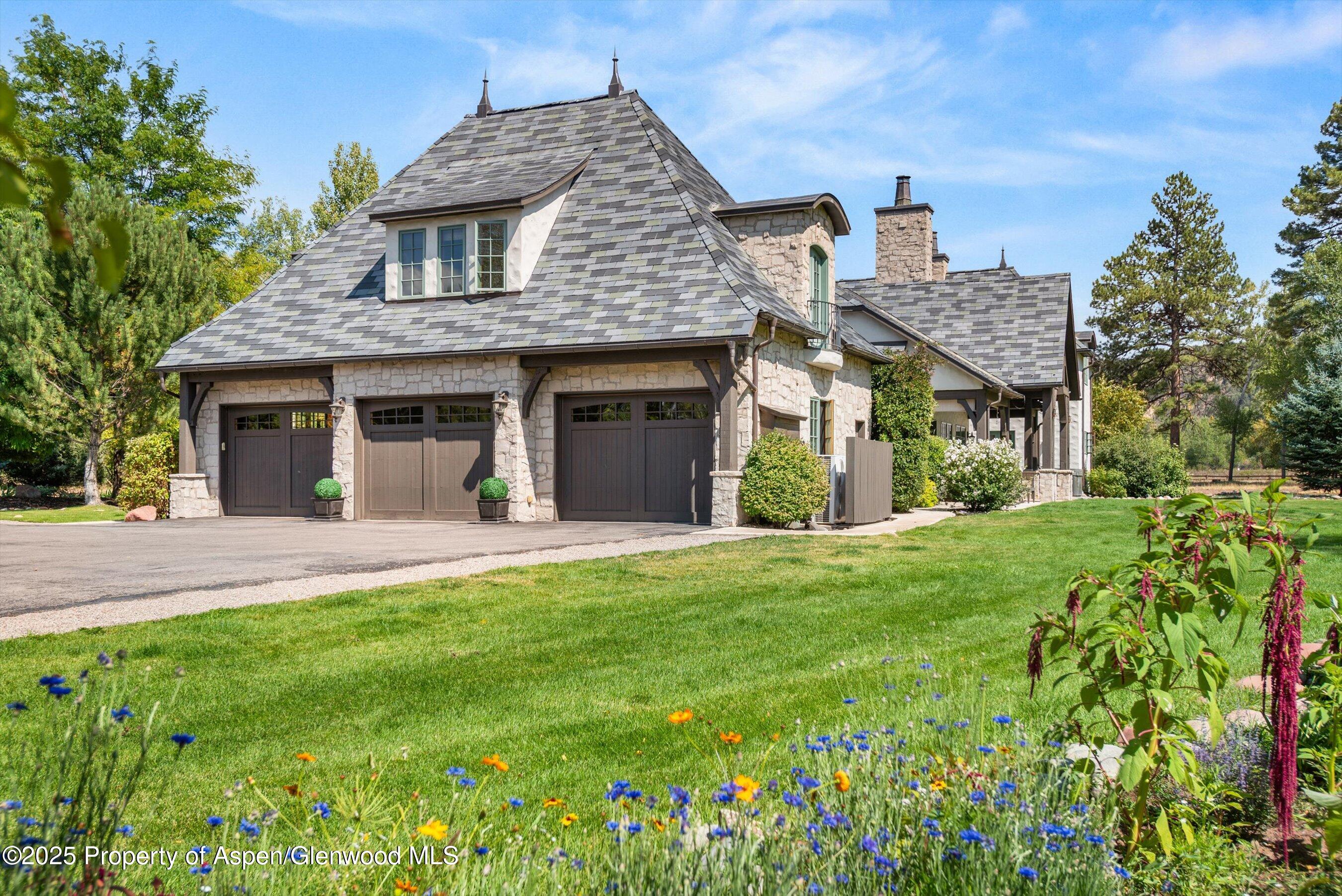 16 St Finnbar Farm Road Carbondale, CO 81623 - Photo 39 of 51 a front view of a house with a garden