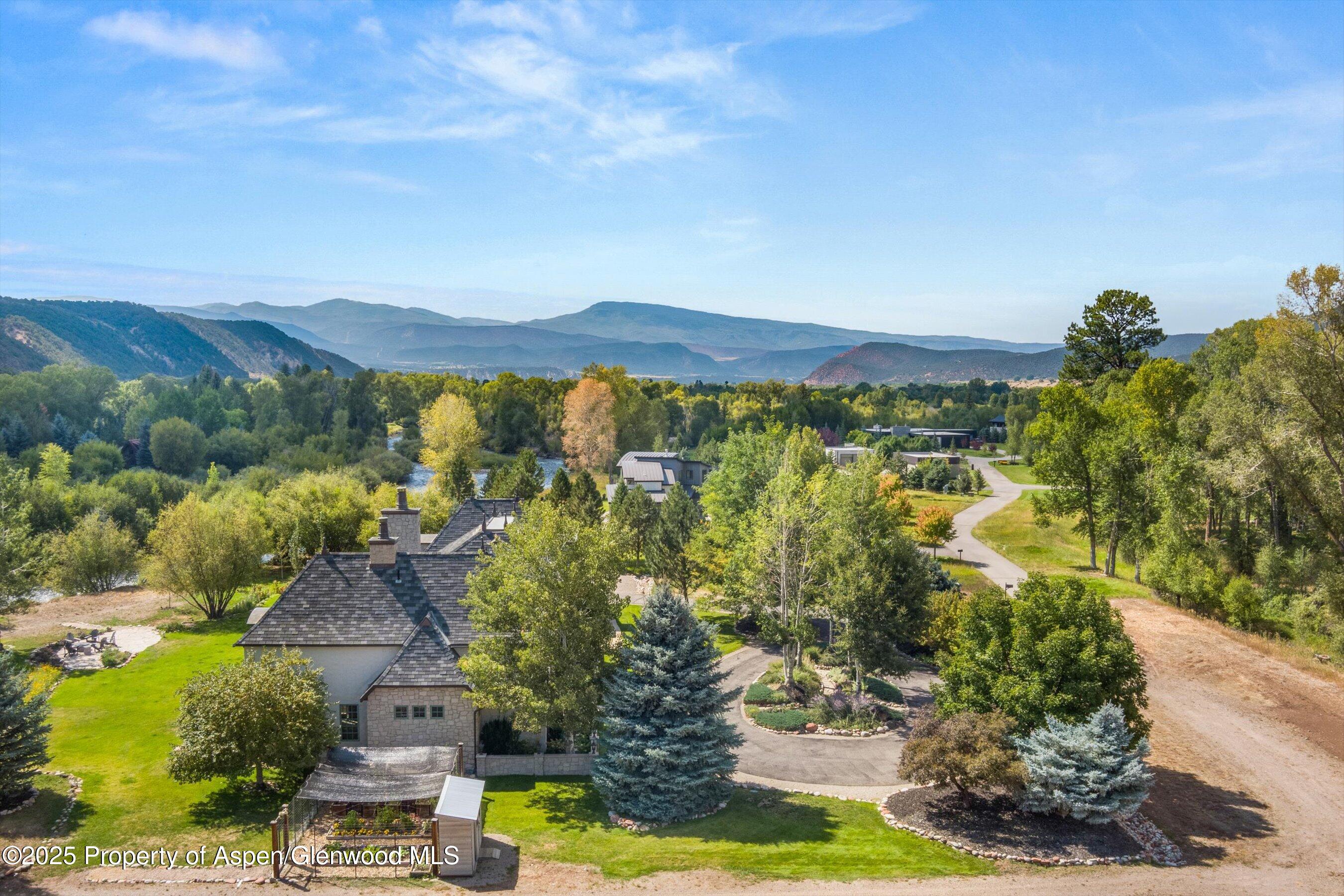 16 St Finnbar Farm Road Carbondale, CO 81623 - Photo 46 of 51 a view of a city with mountains in the background