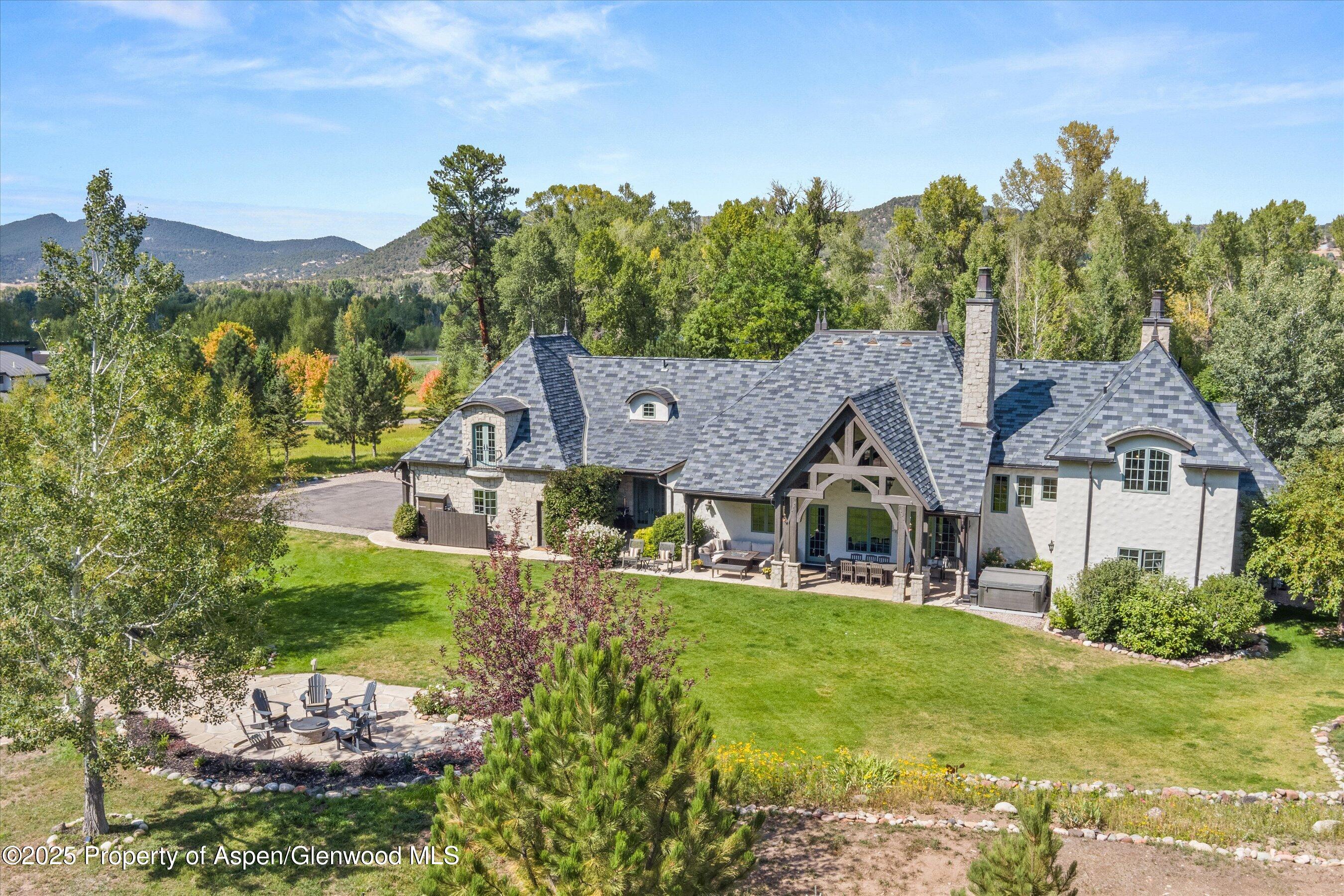 16 St Finnbar Farm Road Carbondale, CO 81623 - Photo 47 of 51 a front view of a house with a yard and large trees
