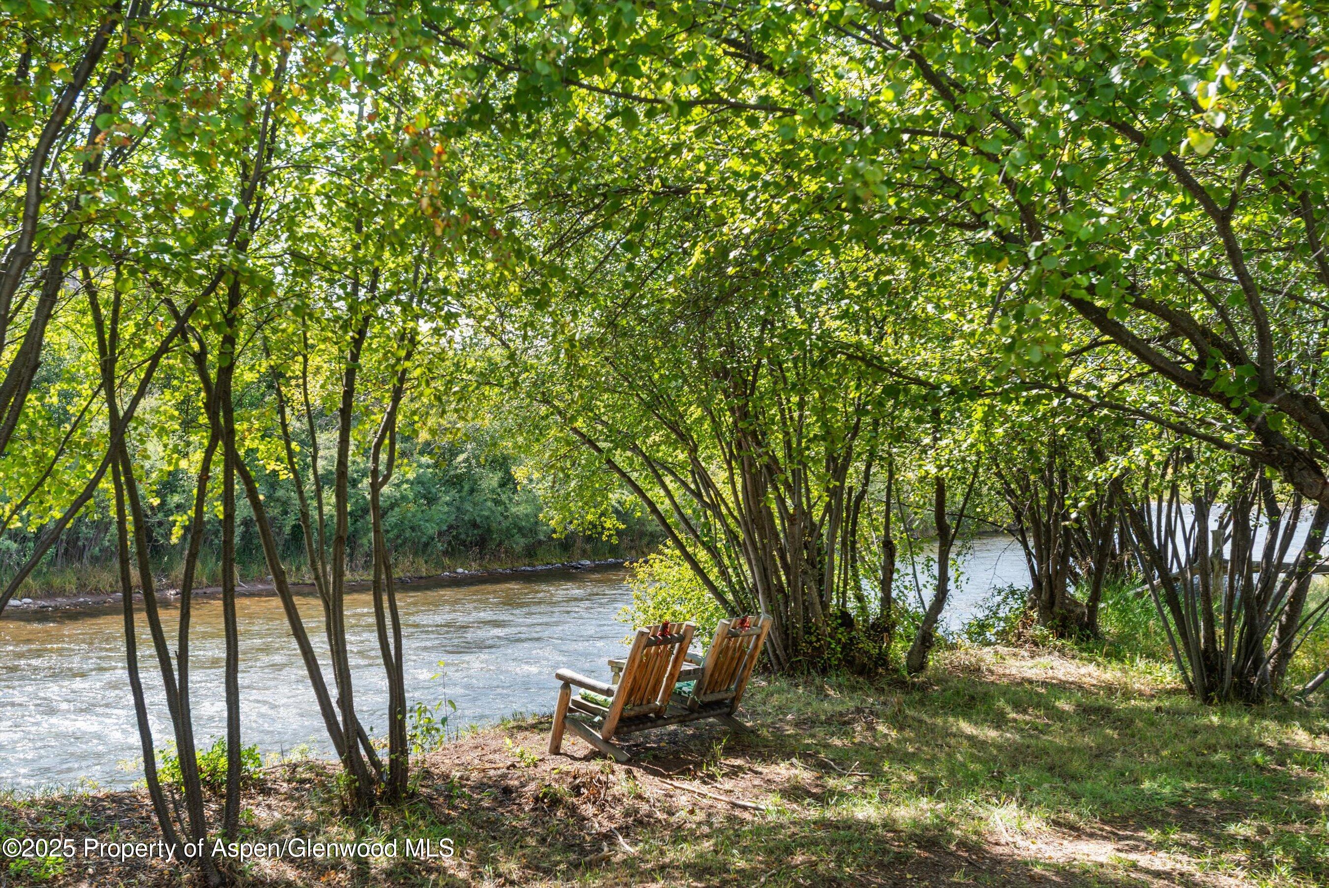 16 St Finnbar Farm Road Carbondale, CO 81623 - Photo 6 of 51 a backyard of a house with table and chairs