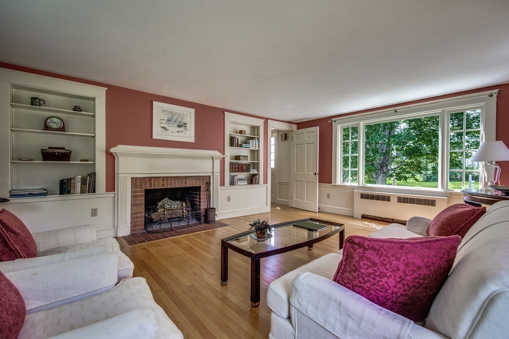 23 Slough Road Harvard, MA 01451 - Photo 17 of 30 a living room with furniture and a fireplace