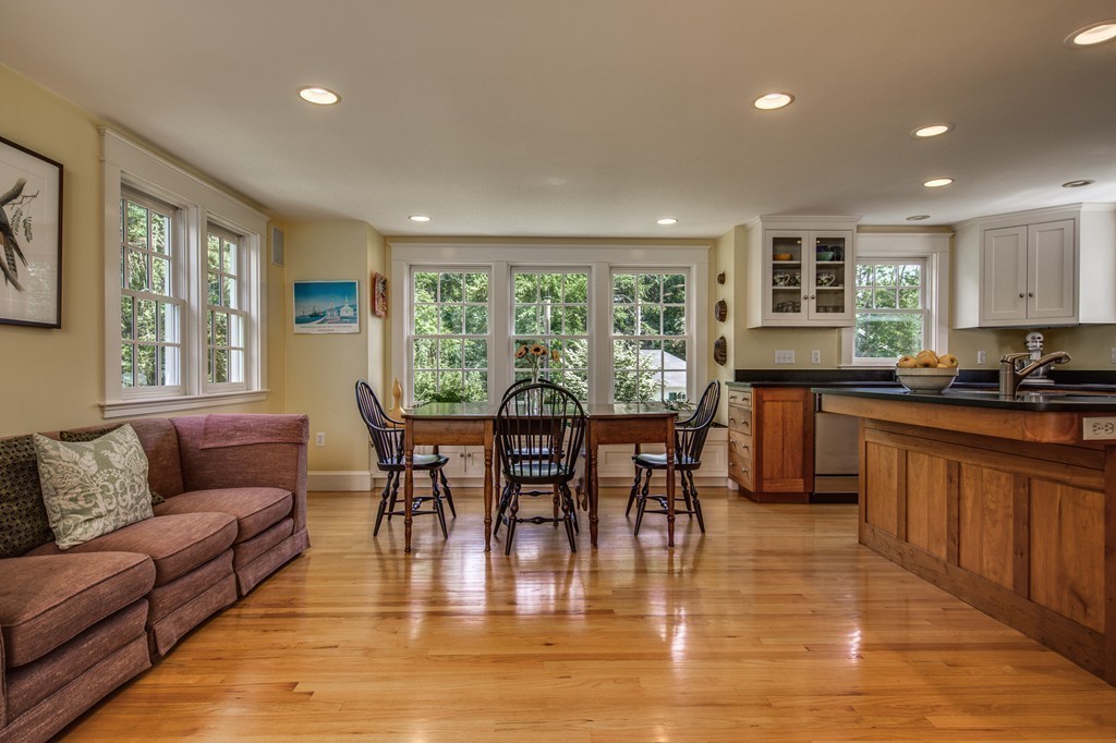 23 Slough Road Harvard, MA 01451 - Photo 3 of 30 a view of a dining room with furniture window and wooden floor