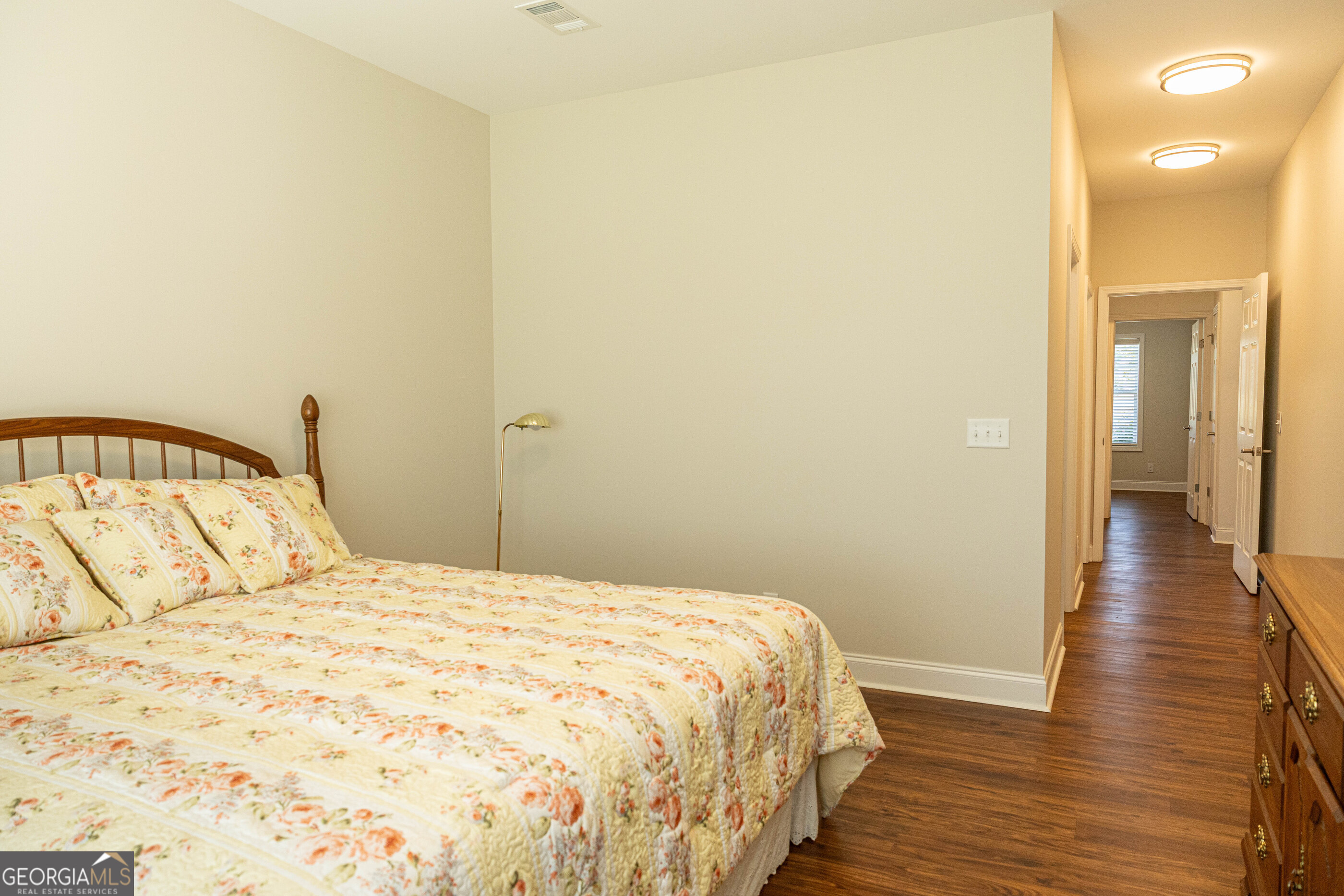 3508 23rd Drive Valley, AL 36854 - Photo 15 of 23 a bedroom with a bed and wooden floor