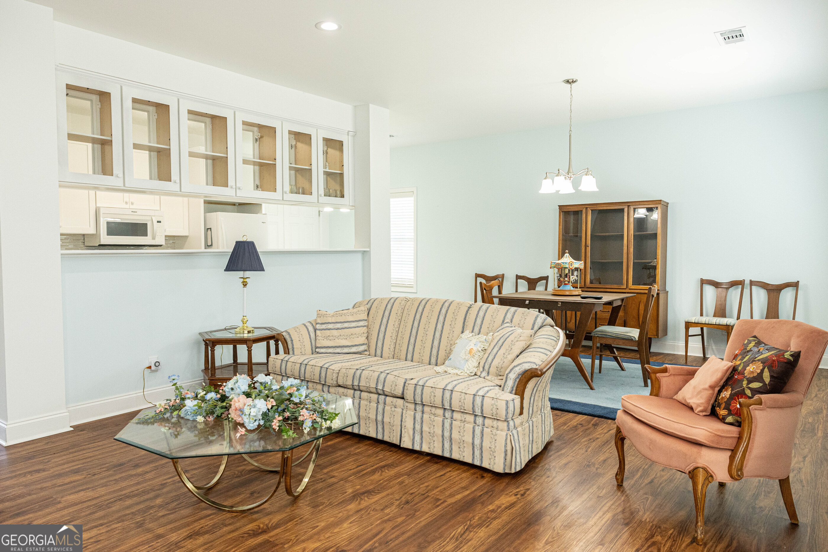 3508 23rd Drive Valley, AL 36854 - Photo 7 of 23 a living room with furniture kitchen view and a wooden floor