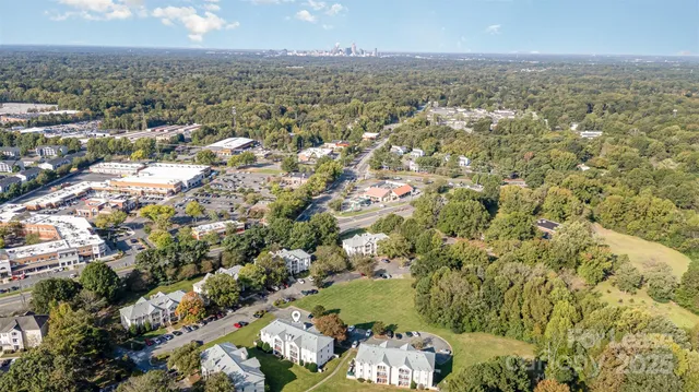 an aerial view of residential building with parking space