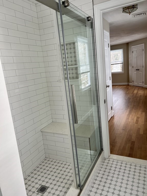 71 Smith Street Wellesley, MA 02482 - Photo 15 of 25 a bathroom with a shower