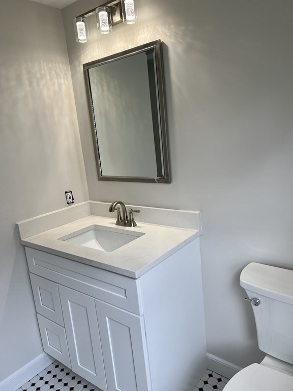 71 Smith Street Wellesley, MA 02482 - Photo 19 of 25 a bathroom with a sink toilet and mirror