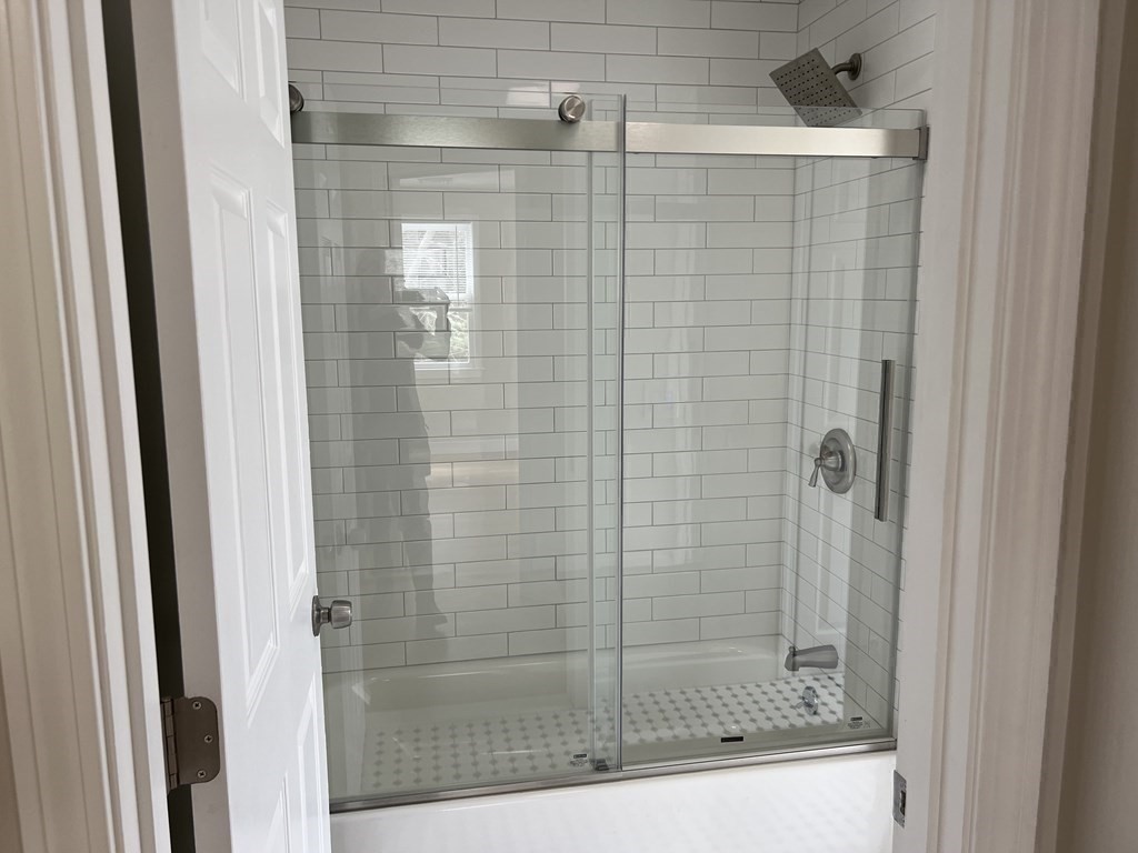 71 Smith Street Wellesley, MA 02482 - Photo 21 of 25 a bathroom with a shower
