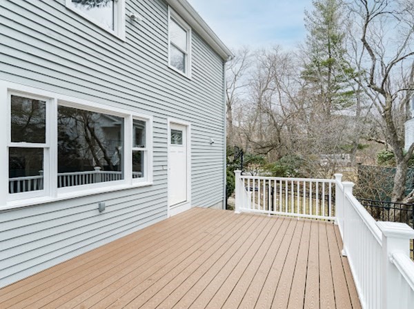 71 Smith Street Wellesley, MA 02482 - Photo 23 of 25 a view of a wooden deck