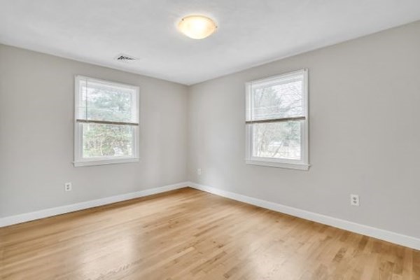 71 Smith Street Wellesley, MA 02482 - Photo 10 of 25 an empty room with a window