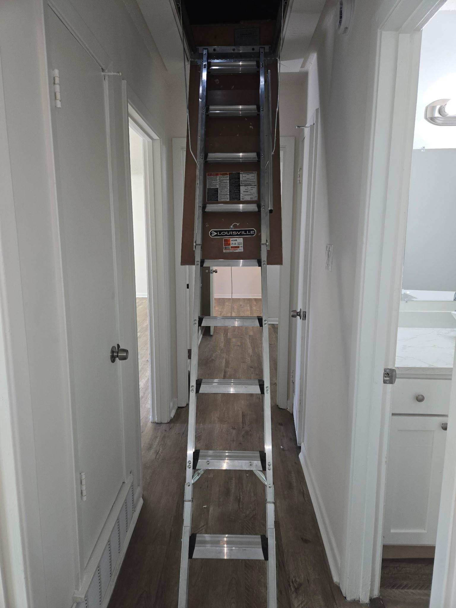 2889 Randy Cove Memphis, TN 38118 - Photo 16 of 18 Hallway featuring wood-finish flooring and white painted walls