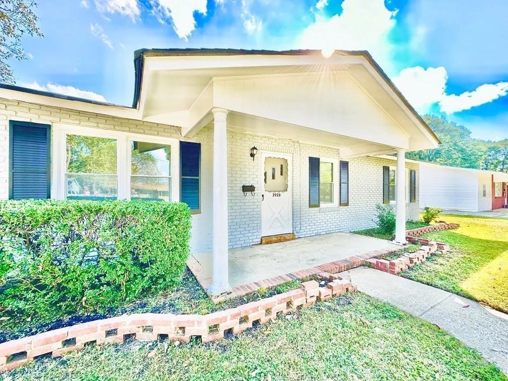 2928 Luckie Street Columbus, GA 31903 - Photo 1 of 32 a front view of a house with garden