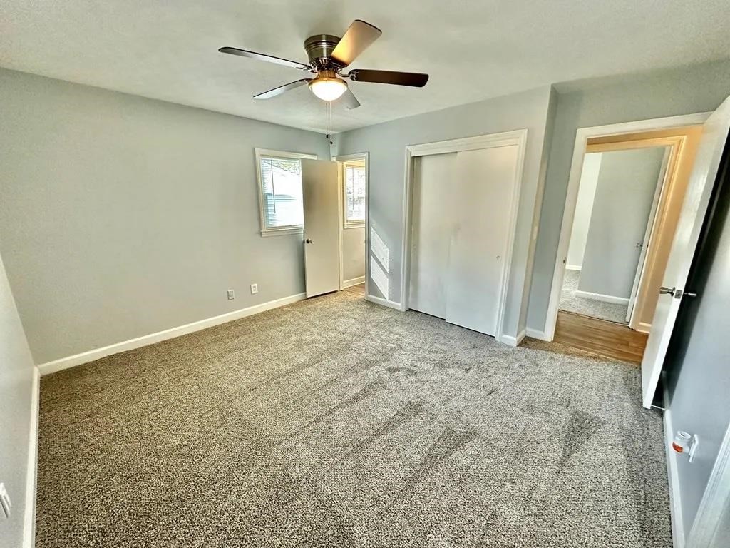 2928 Luckie Street Columbus, GA 31903 - Photo 16 of 32 an empty room with windows and fan