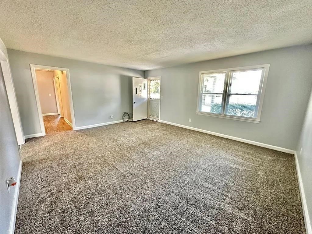 2928 Luckie Street Columbus, GA 31903 - Photo 18 of 32 an empty room with windows