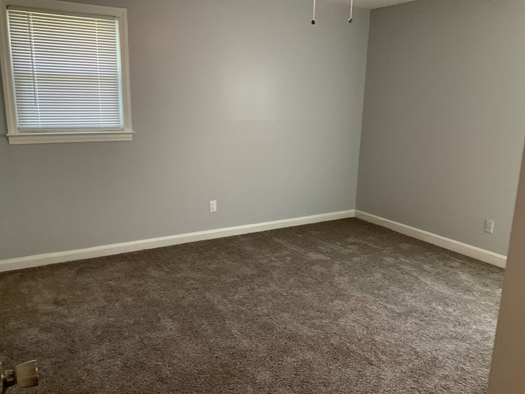 2928 Luckie Street Columbus, GA 31903 - Photo 23 of 32 an empty room with a window
