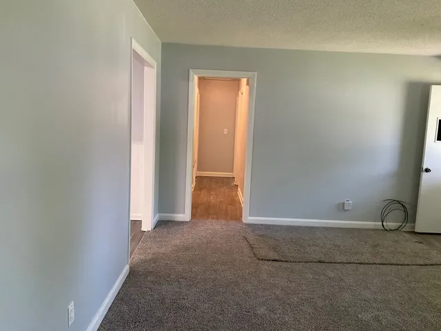 a view of small space with wooden floor