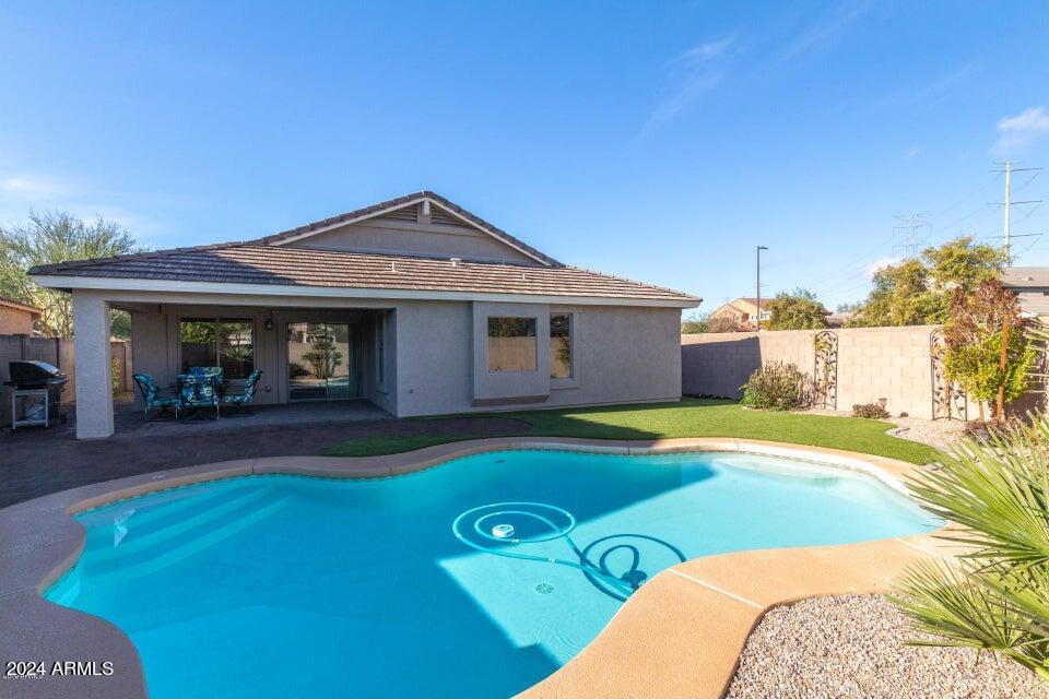 2812 East Questa Drive Phoenix, AZ 85024 - Photo 25 of 32 a front view of a house with swimming pool