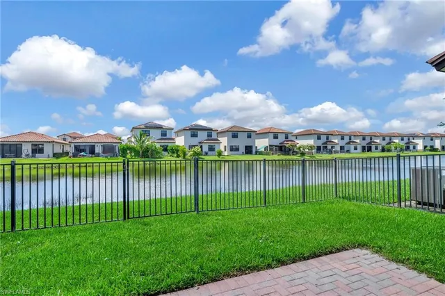 a view of a lake with a city