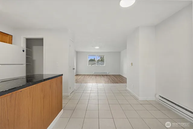 a view of an empty room and window