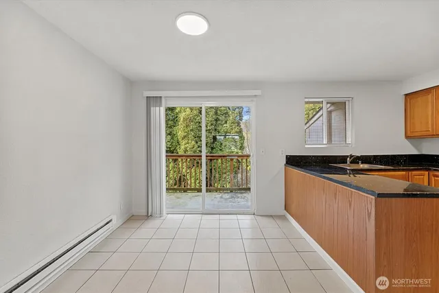 a view of a kitchen with a sink
