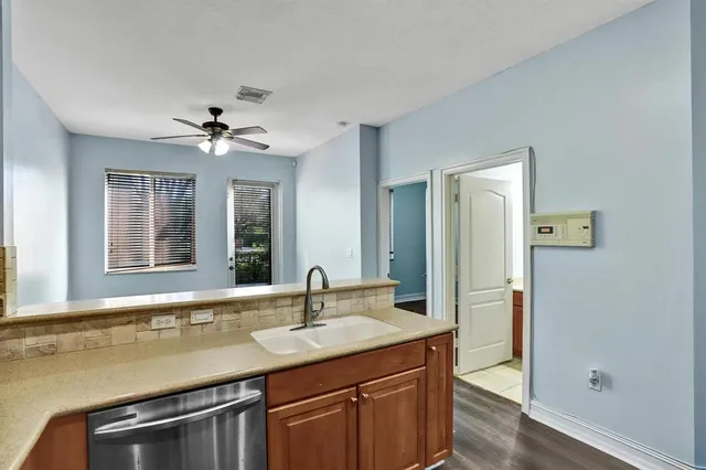 a bathroom with a sink double vanity and shower