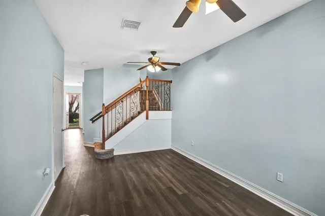 a view of entryway with wooden floor