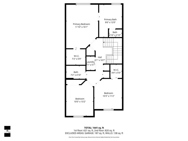 a picture of a bench in front of a wall