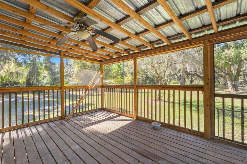 218 Northeast 132nd Terrace Gainesville, FL 32641 - Photo 20 of 40 a view of porch with wooden floor