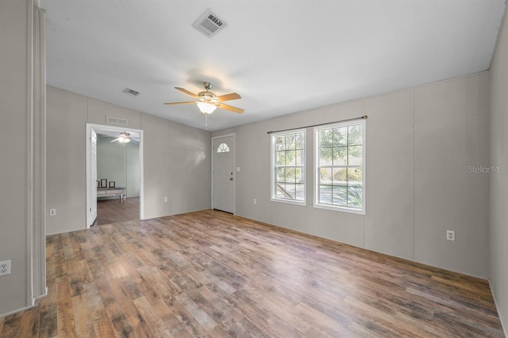 218 Northeast 132nd Terrace Gainesville, FL 32641 - Photo 4 of 40 a view of an empty room with a window
