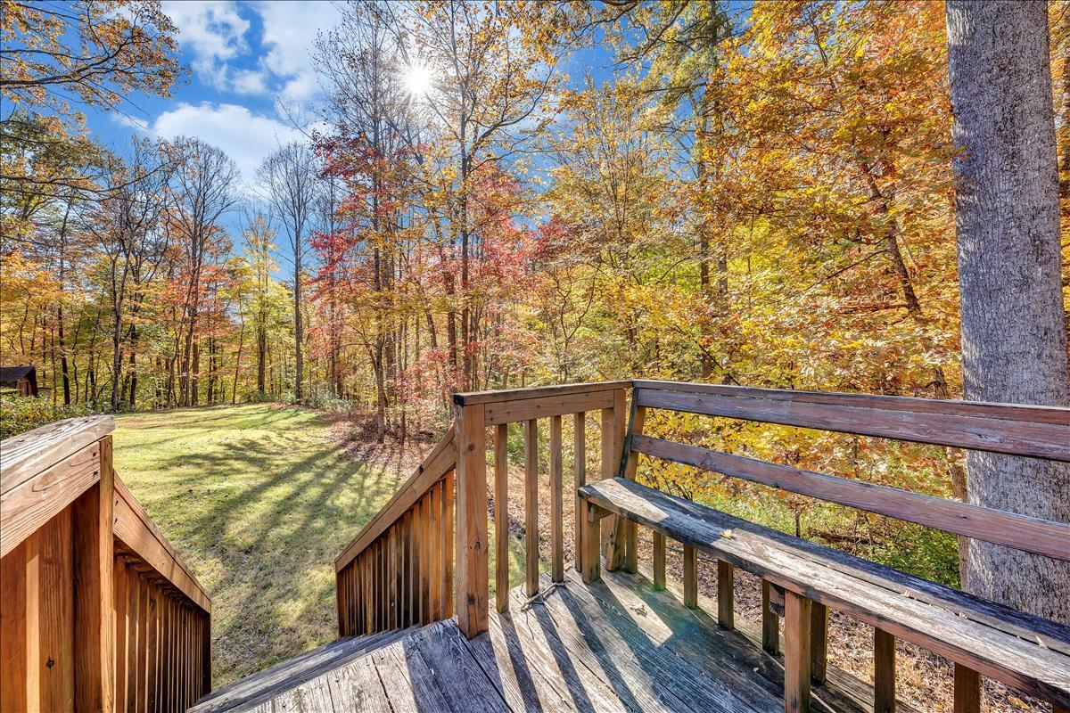 1456 Lynville Ford Road Goodview, VA 24095 - Photo 32 of 45 a view of staircase with large trees