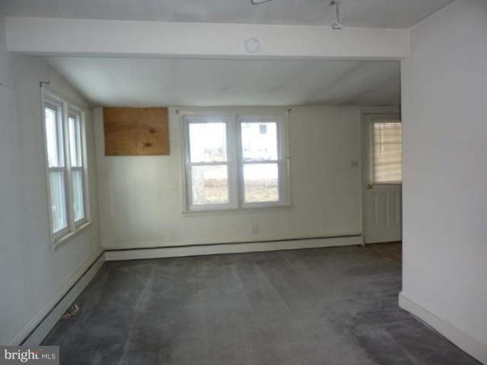 104 Poplar Road Riva, MD 21140 - Photo 3 of 13 an empty room with windows