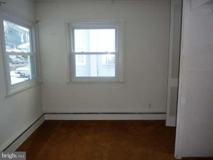 104 Poplar Road Riva, MD 21140 - Photo 5 of 13 an empty room with a window